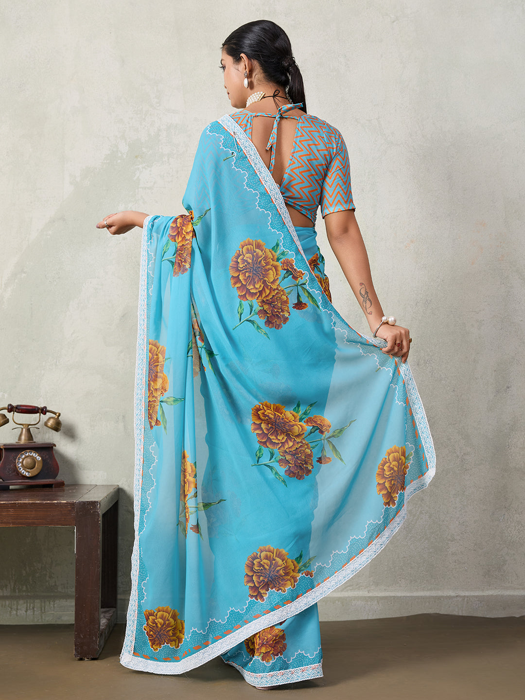 Elegant Floral Printed Georgette Saree with Lace Border